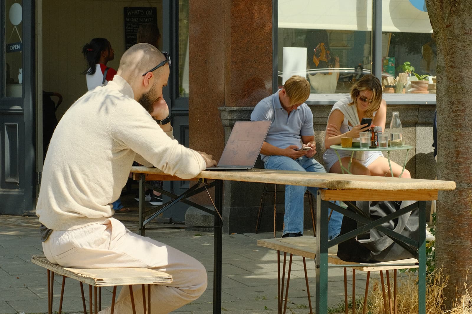 Startup founder writing book from cafe Startup founder writing book from cafe